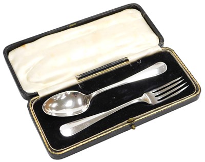 Lot 109 - An Edward VIII silver rat-tail spoon and fork,...