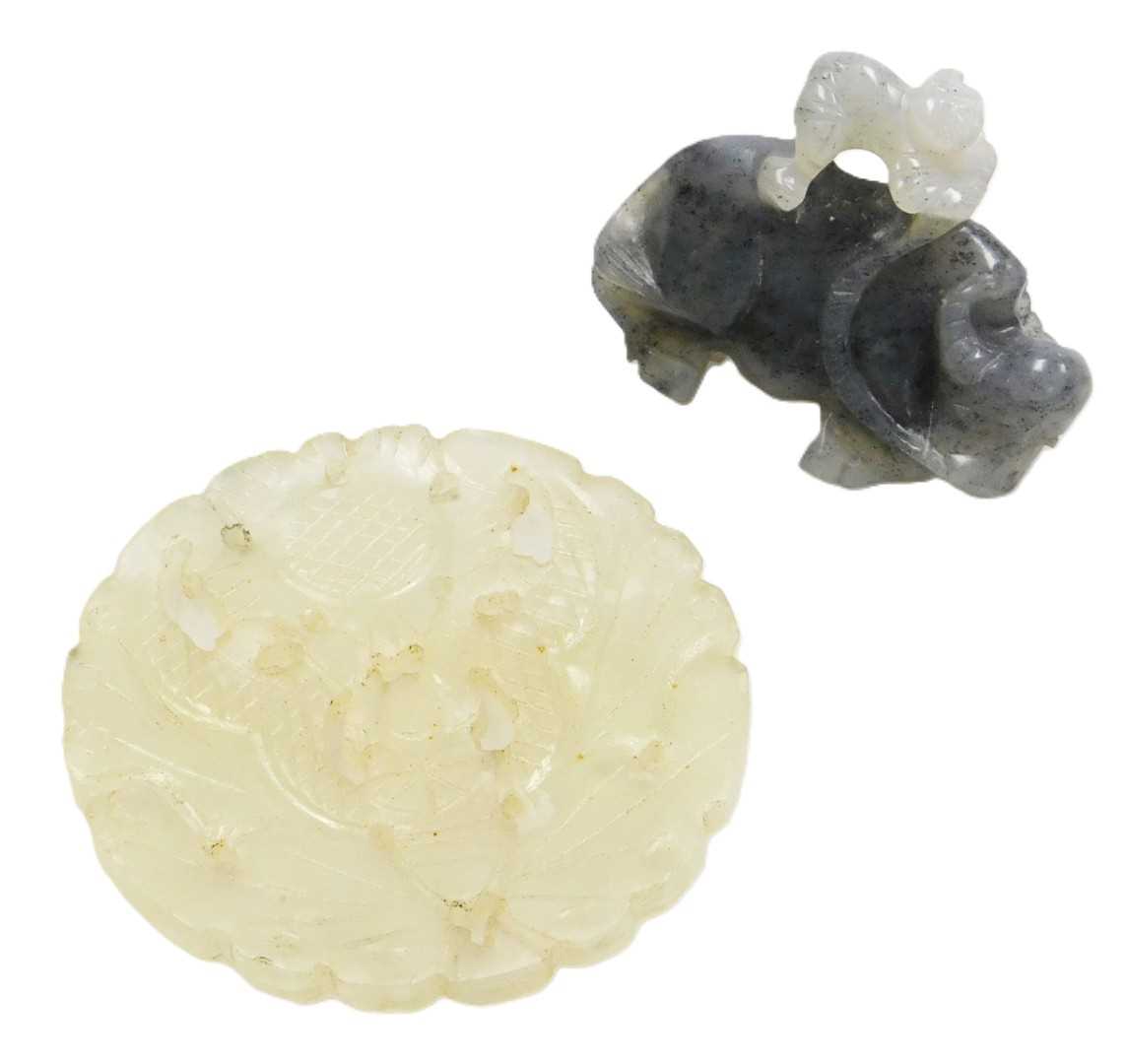 Lot 88 - A Chinese jade pendant, of circular form,...