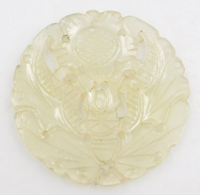 Lot 88 - A Chinese jade pendant, of circular form,...