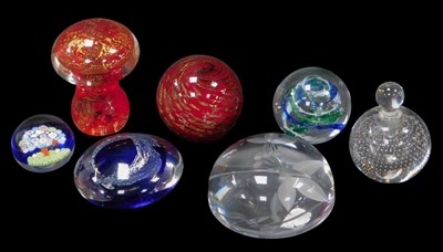 Lot 174 - A group of glass paperweights, to include a...