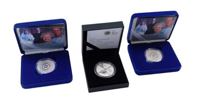 Lot 197 - Three Royal Mint silver proof coins,...
