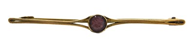 Lot 208 - A Victorian solitaire amethyst bar brooch, in...