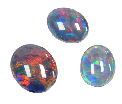 Lot 227 - Three oval opal triplets.