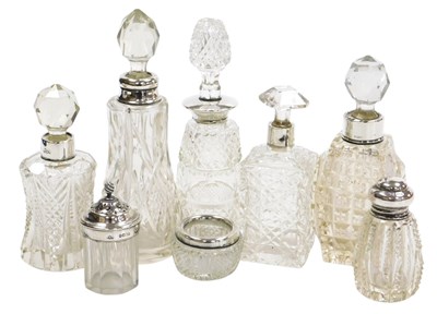 Lot 302 - Five early 20thC cut glass scent bottles, and...