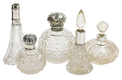 Lot 304 - A Victorian cut glass and silver mounted scent...