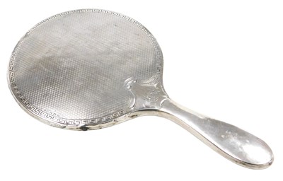 Lot 308 - An Edward VII silver backed hand mirror, with...