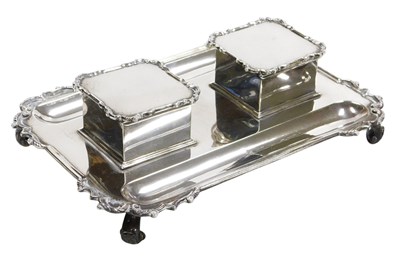 Lot 312 - A George V silver desk stand, of gadrooned...