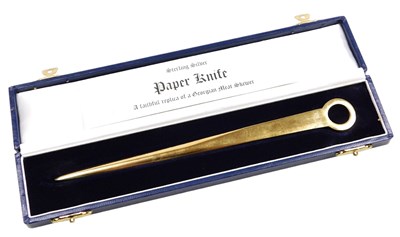 Lot 315 - An Elizabeth II silver gilt paper knife, being...