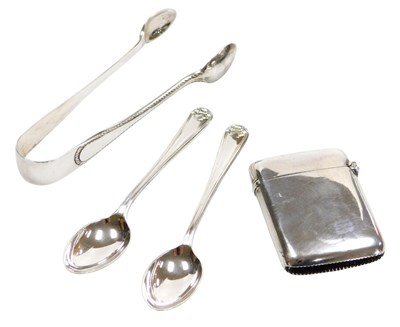 Lot 316 - A pair of George V silver sugar...