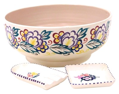 Lot 233 - A Poole pottery fruit bowl, traditionally...