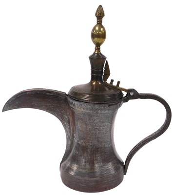 Lot 266 - An Arabic dallah brass coffee pot, with...