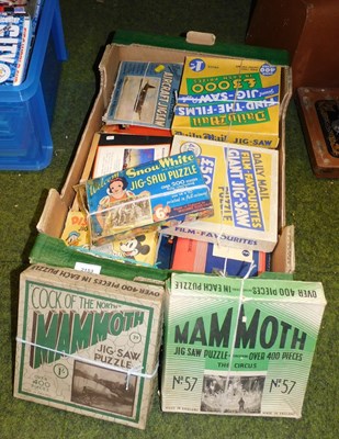 Lot 2153 - A group of vintage jigsaws, to include a...