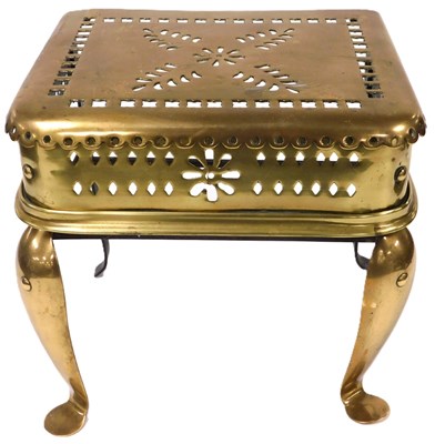 Lot 369 - A 19thC pierced brass footman, the rectangular...