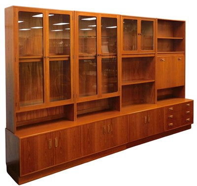 Lot 464 - A teak four section wall unit, part G-Plan and...