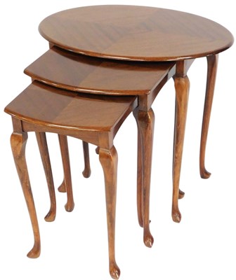 Lot 476 - A 1950s mahogany and stained beech nest of...