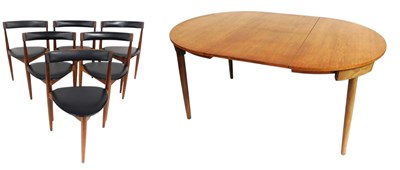 Lot 481 - A Danish teak extending dining table and four...