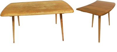 Lot 483 - An Ercol light elm dining table, 136cm x 70cm,...