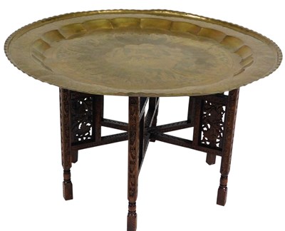 Lot 489 - A Middle Eastern occasional table, with...
