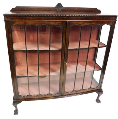 Lot 492 - A 1920s mahogany bow front display cabinet, on...