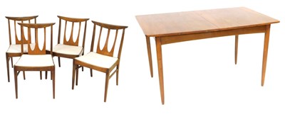 Lot 499 - A G-Plan mid century teak draw leaf dining...