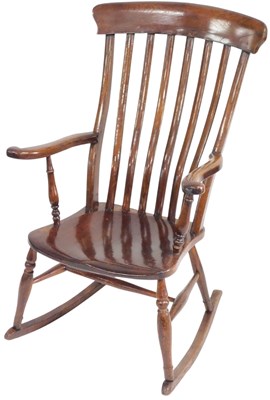 Lot 500 - A Victorian beech and elm lath back...