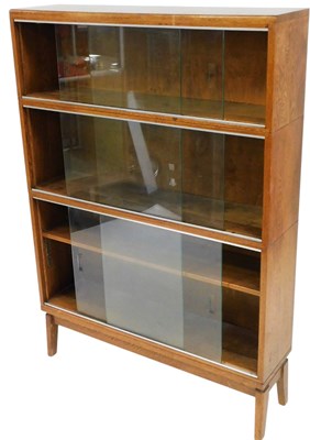 Lot 507 - A glazed oak three height bookcase, with...