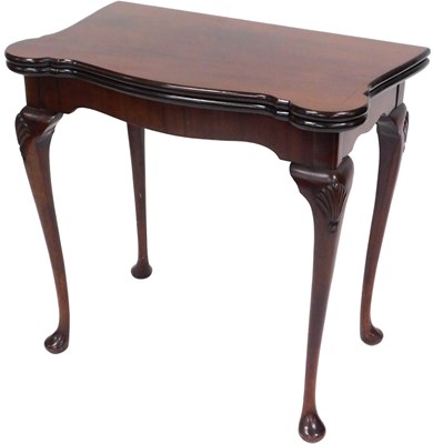 Lot 512 - A George II style mahogany card table, with...