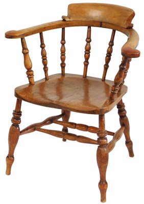 Lot 534 - A Victorian ash and elm smoker's bow chair.