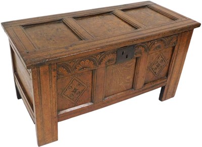 Lot 557 - A 17thC oak coffer, with three panelled top,...