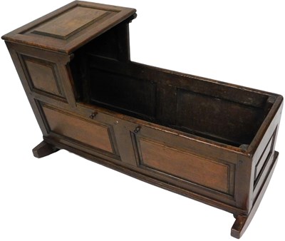 Lot 543 - An early 18thC oak crib, with fielded...