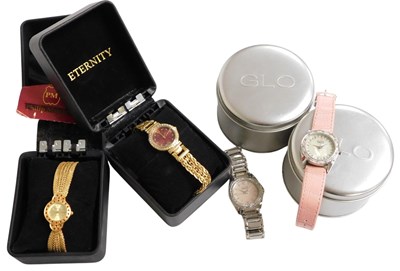 Lot 563 - Four fashion watches, being two by Eternity...