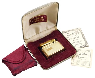 Lot 197 - A Colibri Monopol lighter, the engine turned...
