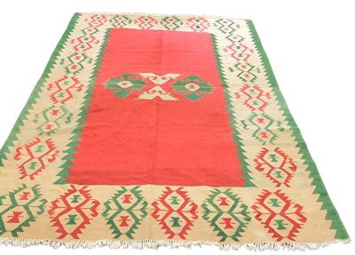 Lot 651 - A Yurdan Turkish kilim red ground rug,...