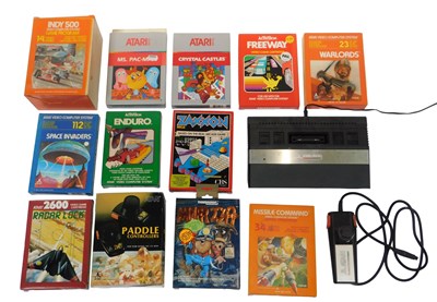 Lot 326 - An Atari 2600 games console, controller and...