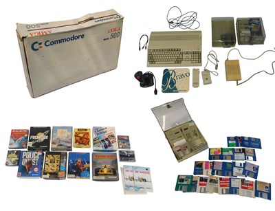 Lot 327 - A Commodore Amiga 500, joystick, and games,...