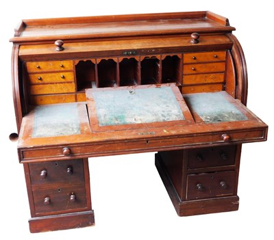 Lot 646 - A Victorian mahogany cylinder bureau, opening...