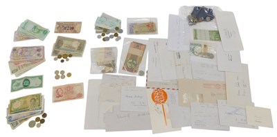 Lot 229 - An accumulation of world banknotes and coinage,...