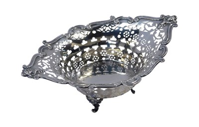 Lot 15 - A George V silver sweetmeat basket, of pierced...