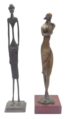 Lot 265 - Two cast metal figures, one depicting a female,...