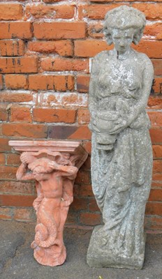 Lot 301 - A composition stone garden figure, modelled as...