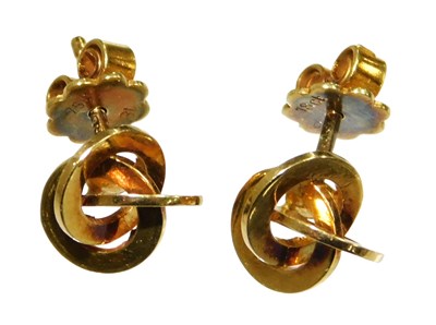 Lot 72 - A pair of 18ct gold triple interlocked band...