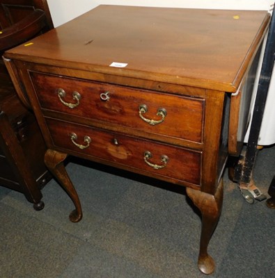 Lot 1054 - A mahogany hall table, with drop flap leaves...