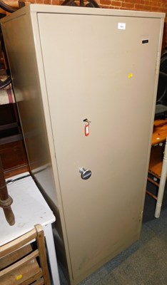 Lot 1061 - A metal locker, with key.