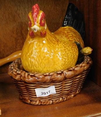 Lot 2017 - A ceramic chicken crock pot, with serving...