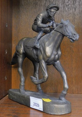 Lot 2029 - A bronzed resin sculpture of a horse and...