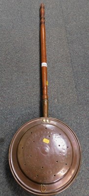 Lot 2040 - A copper and wooden bed pan.