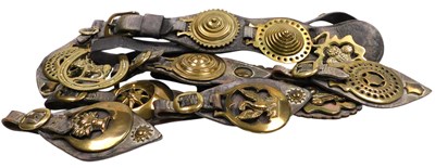 Lot 245 - A group of vintage horse brasses, including...