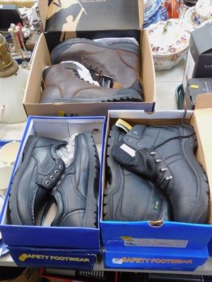 Lot 2058 - Two pairs of black boots, a pair of work boots...