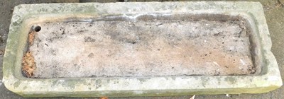 Lot 665 - A rectangular stone livestock feeding...