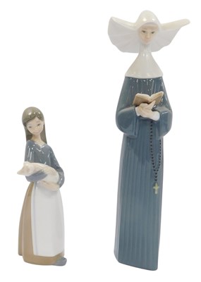 Lot 341 - Two Lladro porcelain figures, modelled as a...